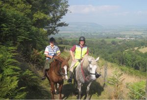 Two horse riders enjoying a relaxing trek along one of the many bridal paths in our wonderful landscape.