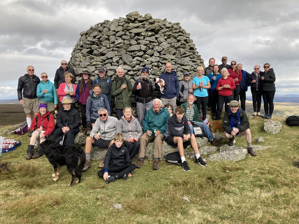 Group photo of walkers at the Drygarn Cairn