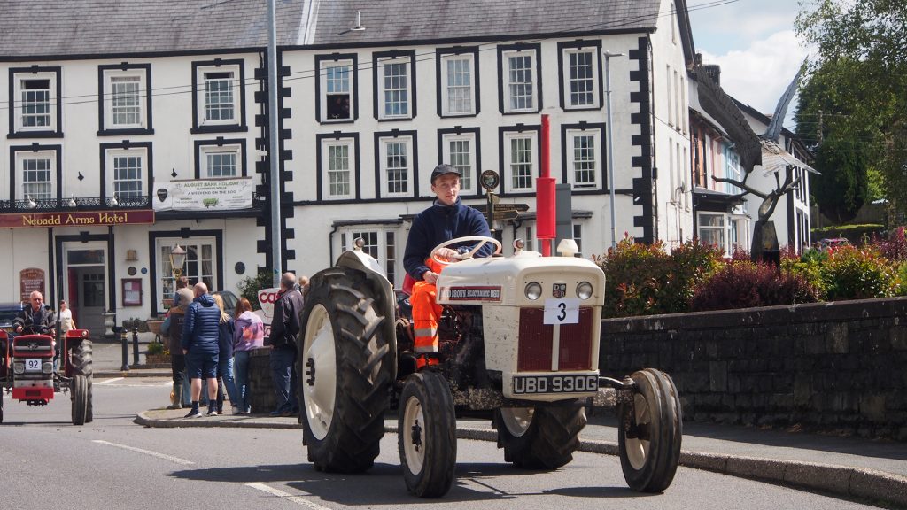 Welsh National Tractor Run. Tractor crossing the main bridge at Llanwrtyd Wells