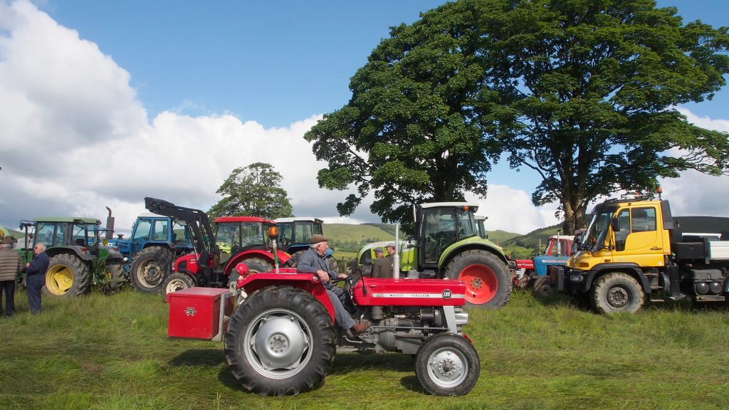 Tractor arriving on a field Welsh National Tractor Road Run